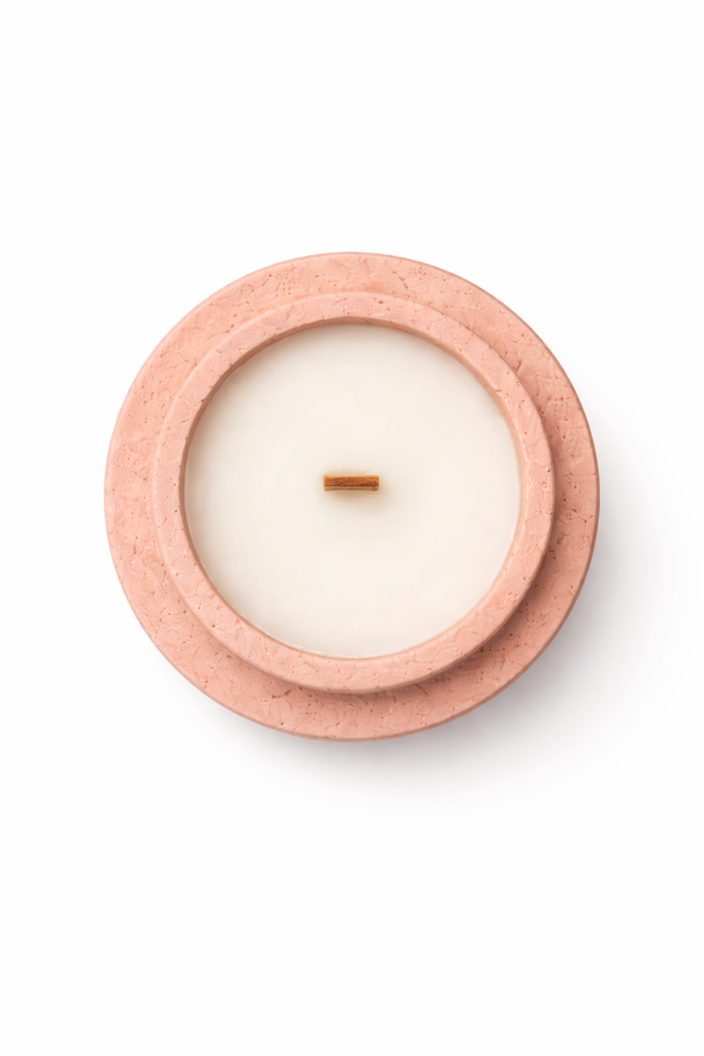 Top-down view of Lumine Rum & Tobacco soy wax candle in a stone-style vessel, showing the wax surface and wick.
