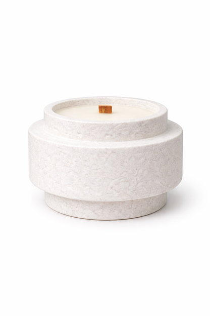 Front view of Lumine Ginger & Grapefruit soy wax candle in a stone-style vessel on a clean studio background.