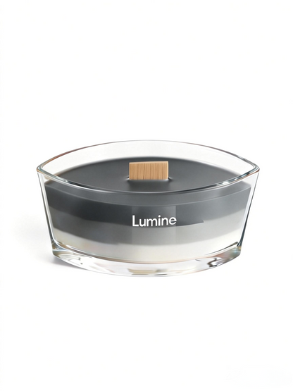 Top view of Lumine White Tea & Moss soy wax candle with the wooden lid removed, showing the wooden wick and layered wax.